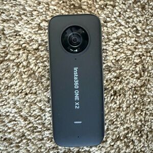 Insta360 ONE X2 Camera with accessories